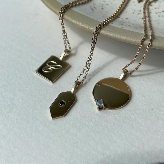 Fine gold pendants by Minima Jewellery